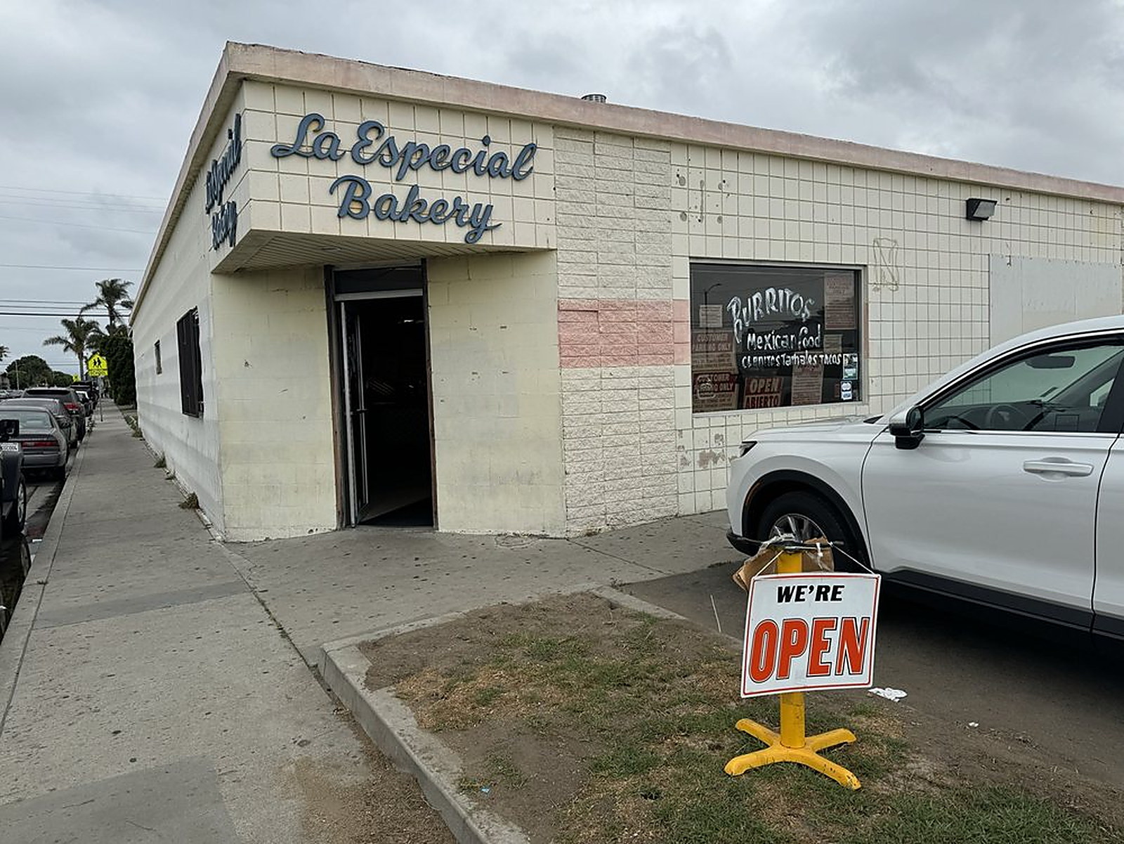 The La Especial Bakery storefront with the open sign