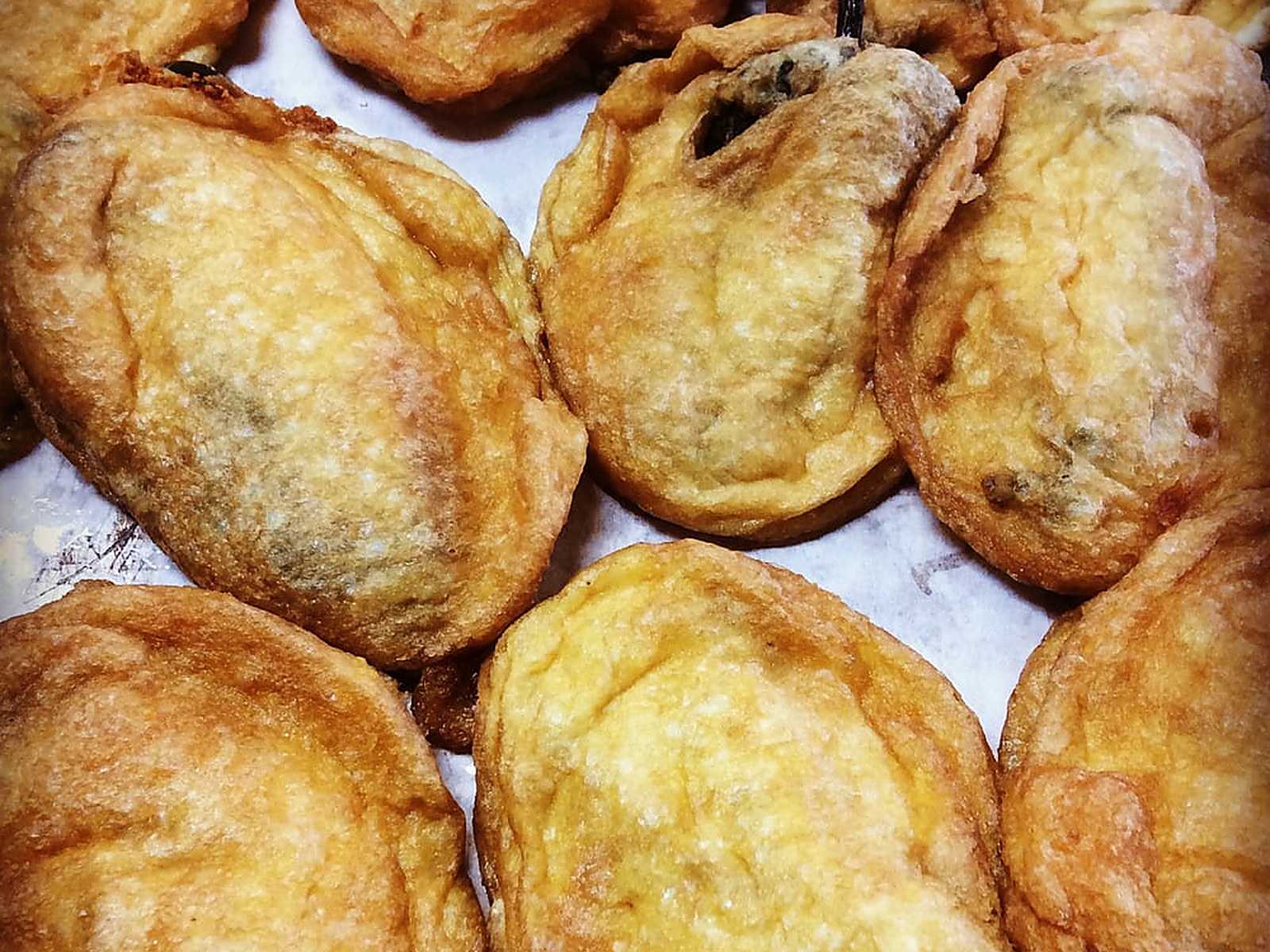A tray of chiles rellenos — Battered in egg and fried golden